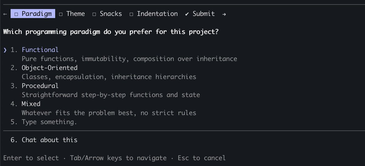 The AskUserQuestion tool in the Claude Code terminal: tabs for Paradigm, Theme, Snacks, Indentation and Submit, the question "Which programming paradigm do you prefer for this project?", and numbered options: Functional, Object-Oriented, Procedural, Mixed, Type something, and Chat about this.
